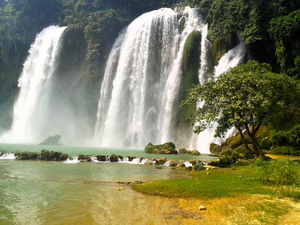 Ban Gioc Waterfall cascading into a turquoise pool