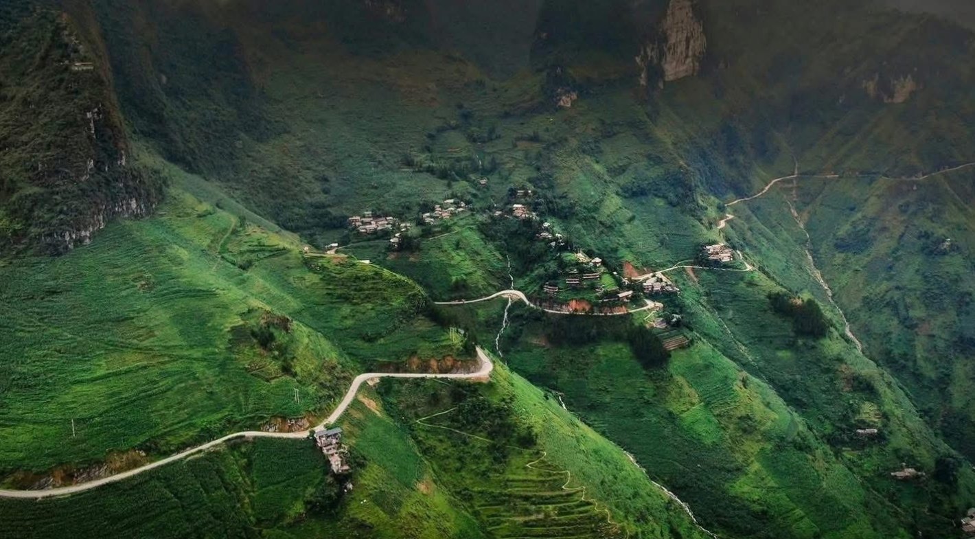 Mountain road winding through the Ha Giang highlands