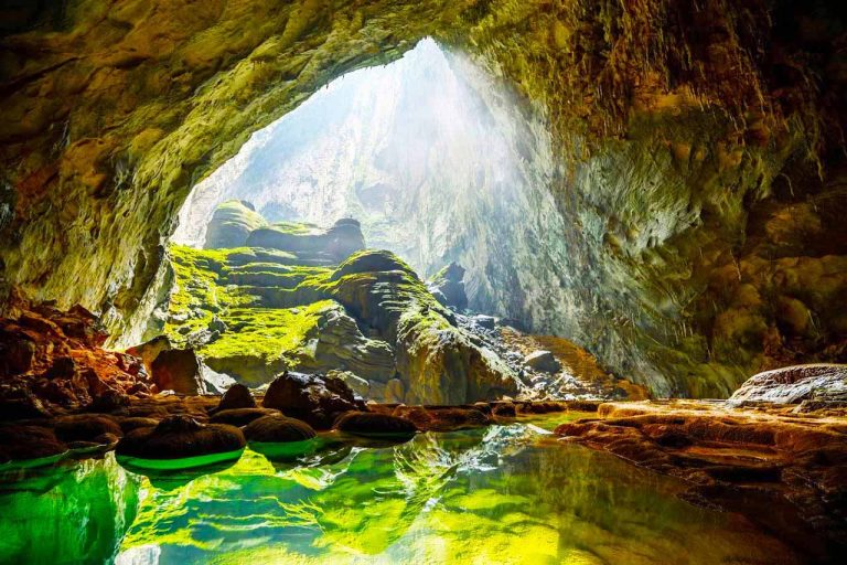 Sunlight beaming into a jungle cave in Phong Nha - Ke Bang - Rose Travel