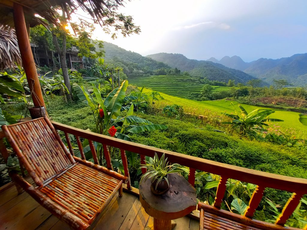 Balcony view over the rice terraces at a Pu Luong eco-lodge